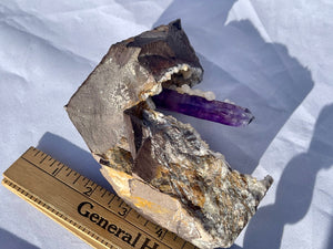Goboboseb Mountains. Erongo Region, Namibia.  Weight: 621.5 grams  Dimensions: L 5 x W 2 x H 4.5 inches  A very unique and special specimen. A really beatiful piece of smoky amethyst on matrix with botryoidal calcite. This one is a very special matrix piece!