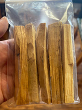 Load image into Gallery viewer, Palo Santo Sticks a.k.a Holy wood, are used to cleanse negative energies. They also remove misfortune and calamity when burned.
