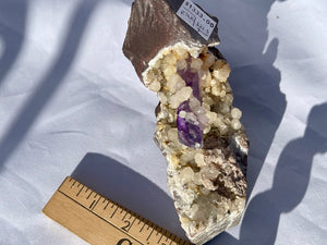 Goboboseb Mountains. Erongo Region, Namibia.  Weight: 621.5 grams  Dimensions: L 5 x W 2 x H 4.5 inches  A very unique and special specimen. A really beatiful piece of smoky amethyst on matrix with botryoidal calcite. This one is a very special matrix piece!