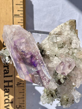 Load image into Gallery viewer, Goboboseb Mountains. Erongo Region, Namibia.  Weight: 180.5 grams  Dimensions: L 5 x W 4 inches x 2.75 inches  So much is going on with this piece. Some notable features include its the insanely gemmy termination thats coated in analcime or the crazy matrix with chlorite terminations. Either way this is definitely one of a kind. 
